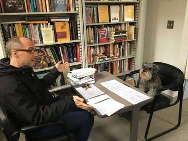 professor hosts office hours with dog