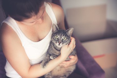 Women holding her cat