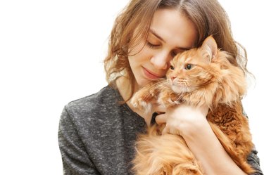 beautiful young woman with a cat