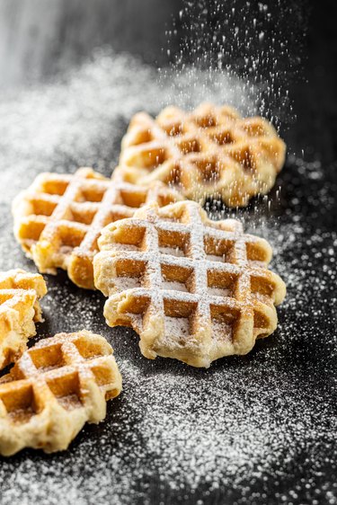 Belgian waffles sprinkled with sugar.