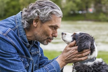 Senior man talking to his dog