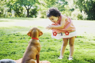 Smiling girl and dog