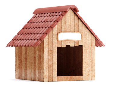 Wooden doghouse isolated on white background
