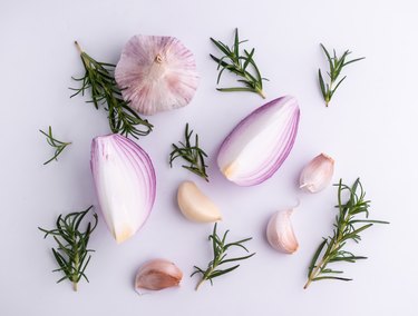 red onion rosemary garlic isolated on white background, top view