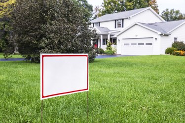 Blank Placard Sign On Suburban Home Front Yard Lawn