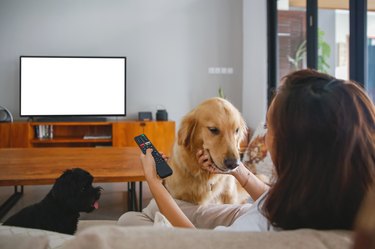 Indonesian Woman Watching Her Favourite TV Show