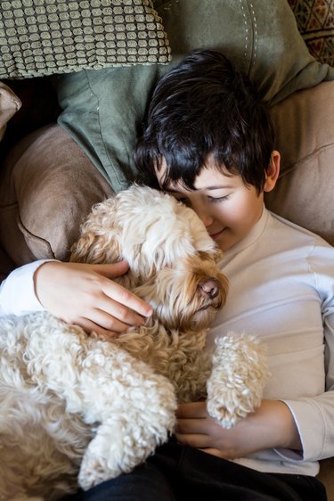 Portrait of a boy and his dog