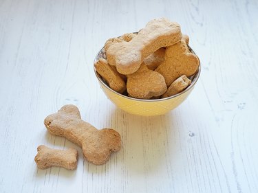 Homemade dog biscuits in a bowl.