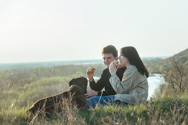 young couple in love on a picnic in nature