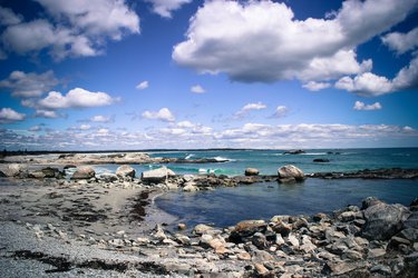 Clouds over coastline and sea in Kejimkujik National Park, Nova Scotia, Canada