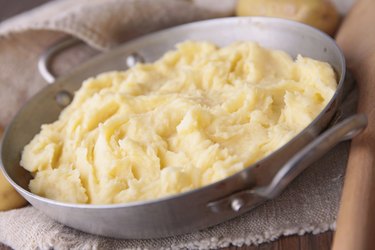 mashed potatoes in metal bowl