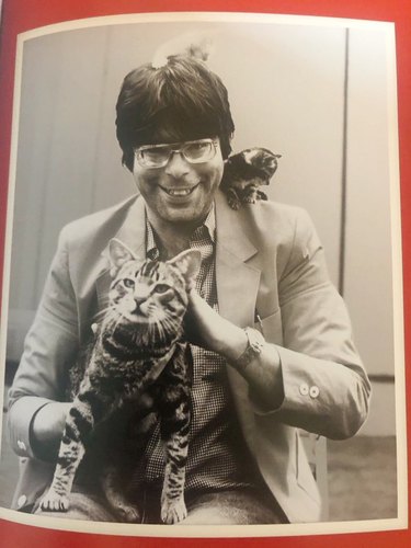 photo of Stephen King holding cats
