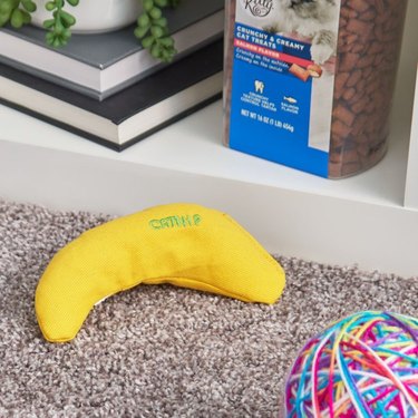 Banana-shaped cat toy