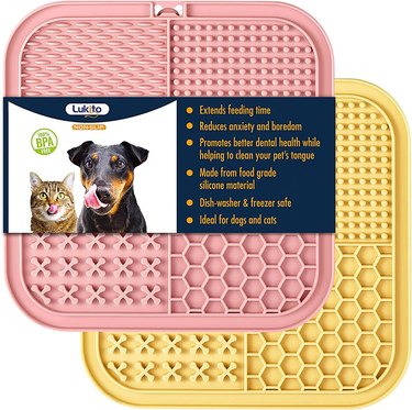 Two pack of dog lick mats, one pink and one yellow.