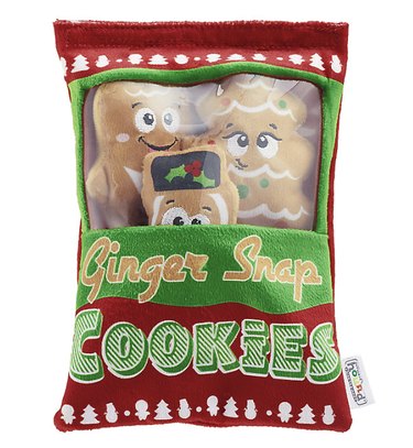 Interactive dog toy shaped like a bag of ginger snap cookies with a see-through window that reveals the gingerbread people inside.
