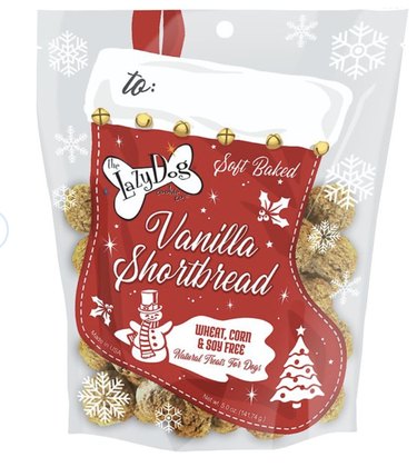 Bag of vanilla shortbread dog cookies in the shape of a Christmas stocking.