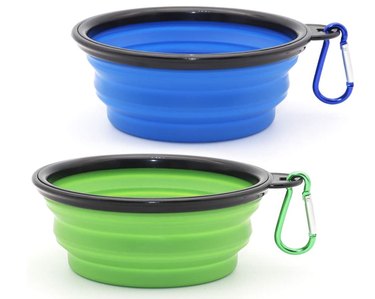 Blue and green collapsible water bowls for dogs with carabiner clips.