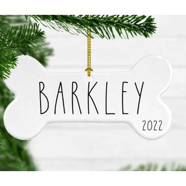 A dog bone-shaped ornament with the name "Barkley" printed on it
