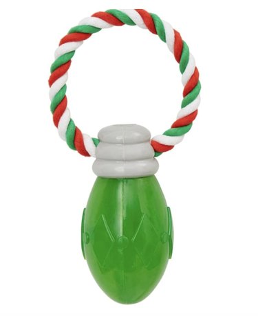 Tug of war dog toy with a Christmas-colored rope loop at one end and a green 'lightbulb' at the other.