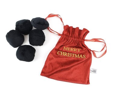 Red Santa's sack that says "Merry Christmas" in gold lettering with black pieces of coal that your dog can play with.