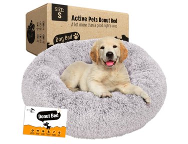 Active Pets Plush Calming Dog Donut Bed with cute yellow lab pup on top.