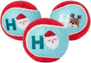 Blue and red Christmas tennis ball dog toys.