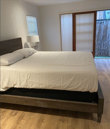 Clean queen-size bed in Venice Beach studio apartment