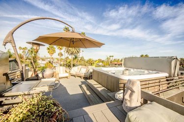 Rooftop patio with hot tub and outdoor seating in Venice Beach