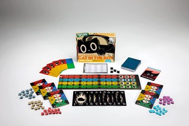 Bezier Games Cat in The Box Deluxe Edition shown with the pieces and cards all layed out against an off-white background.