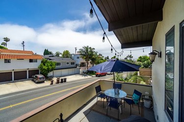 Patio balcony with outdoor seating and ocean views in San Clemente.