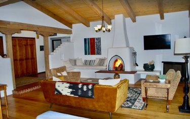 A fireplace in the living room of a three-bedroom home in Santa Fe