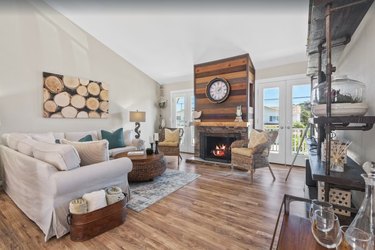 Bright and area living room with fireplace in Dana Point Lantern District home.