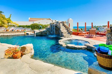 Exceptional pool area with spa, waterfall, and water slide in San Clemente backyard.