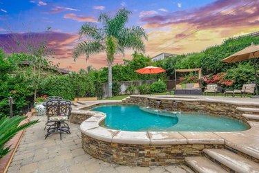 Beautiful freeform swimming pool and spa in private backyard in Dana Point.