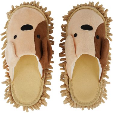 a pair of dog slippers with microfiber scrub bottoms.