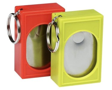 CRMADA Box Training Clickers placed side-by-side. One is red and the other is lime green. The metal interior is exposed and the button is on the smaller side.
