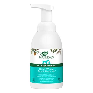 A bottle of Ark Naturals Don't Worry Don't Rinse Me Waterless Dog & Cat Shampoo. The bottle has a pump and it's pictured against a white background.