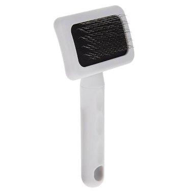 Whisker City® Slicker Cat Brush against a white background. The brush has a white frame and a black pad with thin metal bristles.