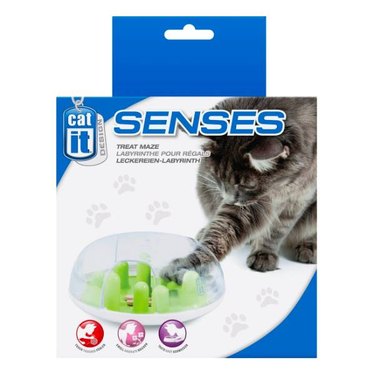 A Catit Senses Treat Maze Cat Toy box featuring a grey cat retrieving treats from the dome