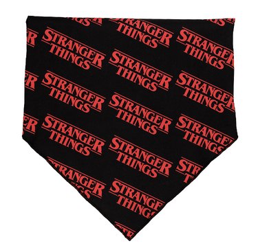 Stranger Things bandanna against a white background. The bandana is shaped like an upside down house and is black with red text.