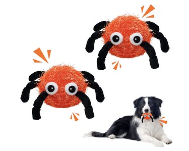 Two orange hairy spider toys with a squeaky ball inside each one.