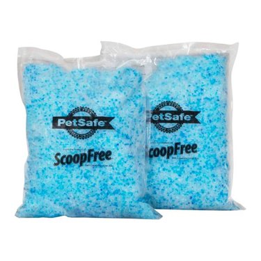 Two 4.5-pound bags of PetSafe ScoopFree Premium Crystal Cat Litter against a white background. The crystal litter is different shades of blue with some clear crystals mixed in.