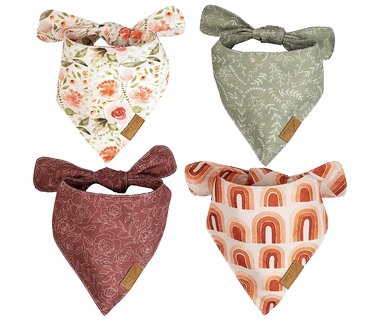 Four dog bandanas with nature motifs like flowers, greenery, and rainbows.