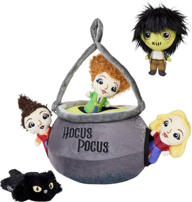 Hide and seek plush dog toy with Sanderson sisters, Binx, and Billy that all fit inside a gray cauldron that says "Hocus Pocus."