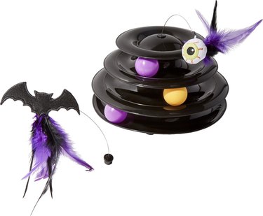 Frisco Halloween Cat Tracks Cat Toy with a black track, purple and orange balls, and two springy toys (one eyeball and one bat with feathers).