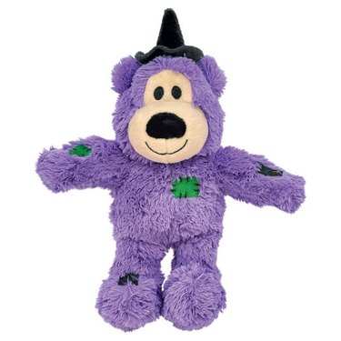 Purple plush bear with witch's hat and green and black patchwork.