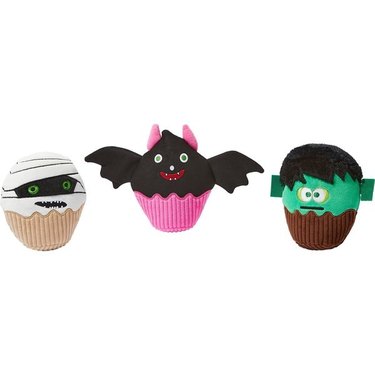 Three-pack of Halloween cupcake toys for dogs. One is a mummy, another is a bat, and the third is a Frankenstein monster. They squeak and contain crinkle material.