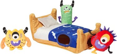 Monsters under the bed hide-and-seek puzzle toy with three plush monsters and a bed base with holes for hiding the toys.