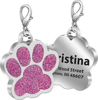 Paw print shaped ID tag with pink glitter on one side and your dog's information on the other.