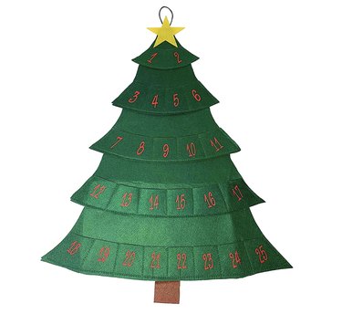 Felt advent calendar shaped like a Christmas tree with a star at the top. It's reusable and the pockets can fit treats like Milk Bones.